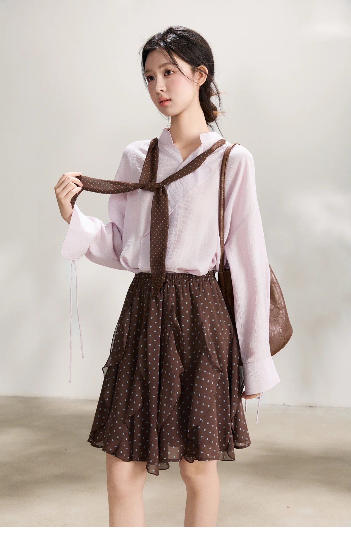 MISHOW Women's Asymmetric V Neck Shirts 2026 Spring Lapel Casual Loose Tie Cuffs Solid Shirt with Polka Dot Ribbon MXF108X1002