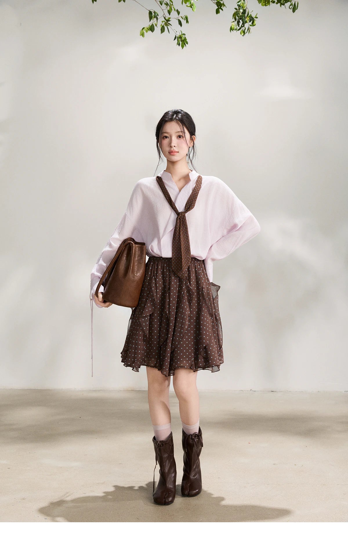 MISHOW Women's Asymmetric V Neck Shirts 2026 Spring Lapel Casual Loose Tie Cuffs Solid Shirt with Polka Dot Ribbon MXF108X1002