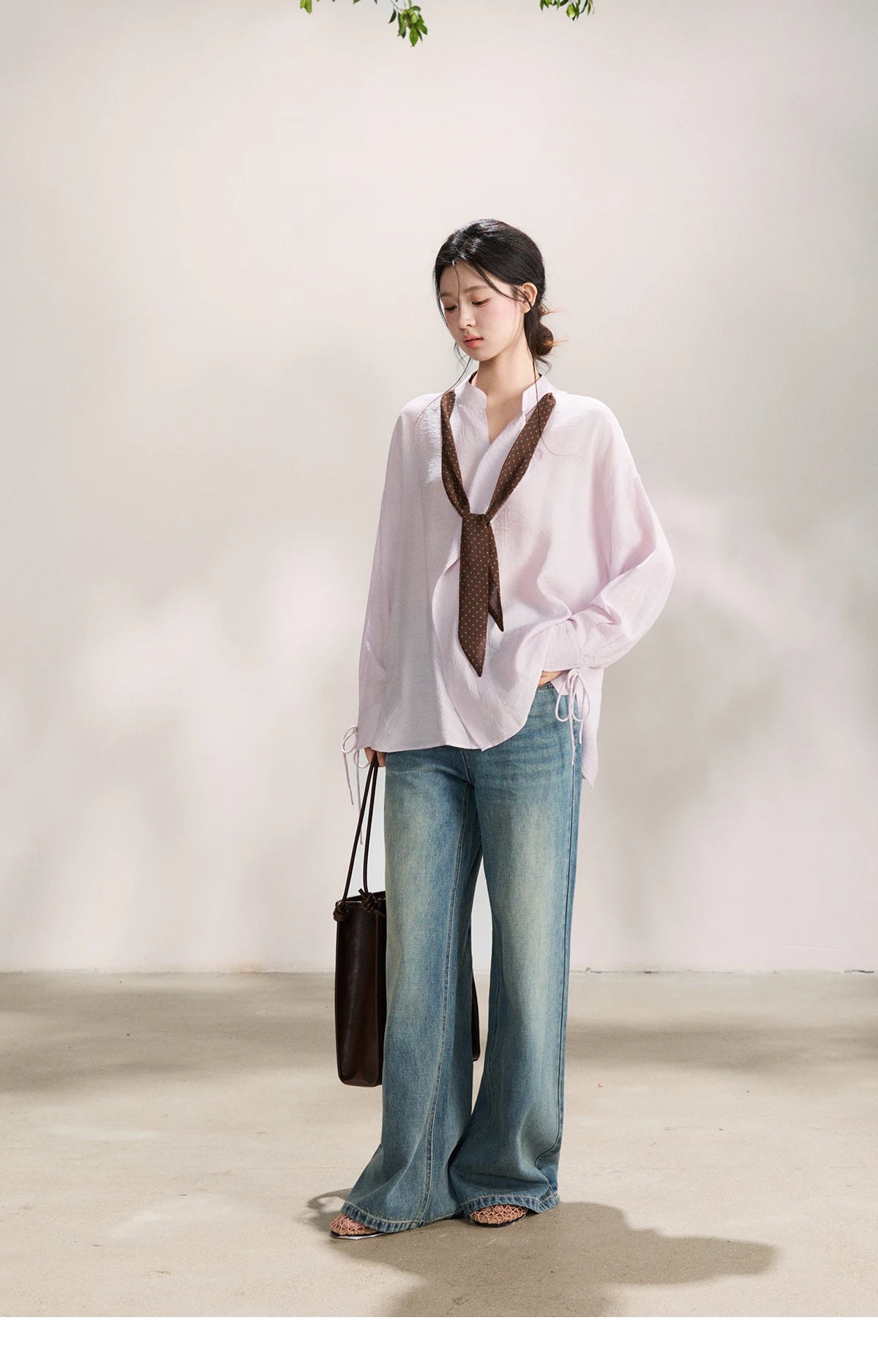 MISHOW Women's Asymmetric V Neck Shirts 2026 Spring Lapel Casual Loose Tie Cuffs Solid Shirt with Polka Dot Ribbon MXF108X1002