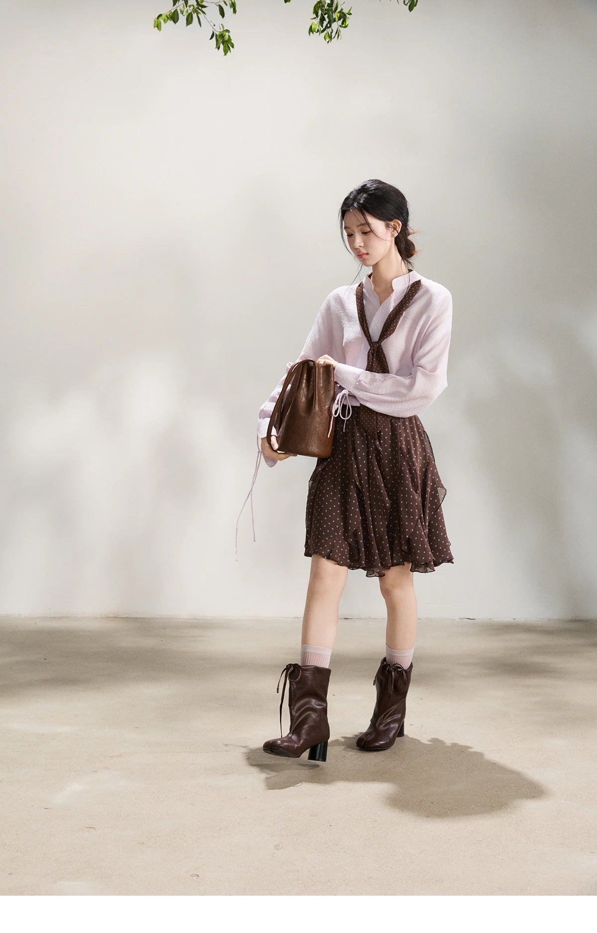 MISHOW Women's Asymmetric V Neck Shirts 2026 Spring Lapel Casual Loose Tie Cuffs Solid Shirt with Polka Dot Ribbon MXF108X1002