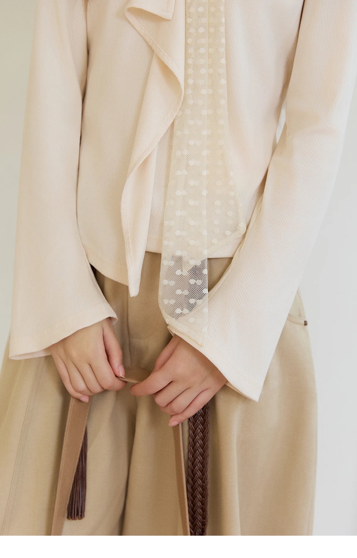 MISHOW Women's V-neck Splicing Lace Ribbon Long Sleeve Tops Spring Ruffled Asymmetrical Hem Flare Sleeve Knitwear MXF108Z1016