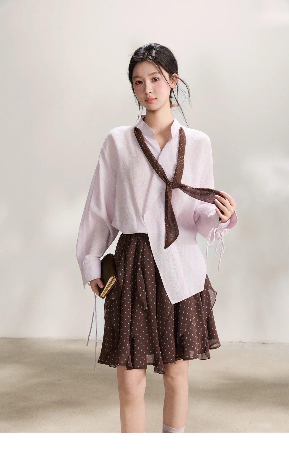 MISHOW Women's Asymmetric V Neck Shirts 2026 Spring Lapel Casual Loose Tie Cuffs Solid Shirt with Polka Dot Ribbon MXF108X1002