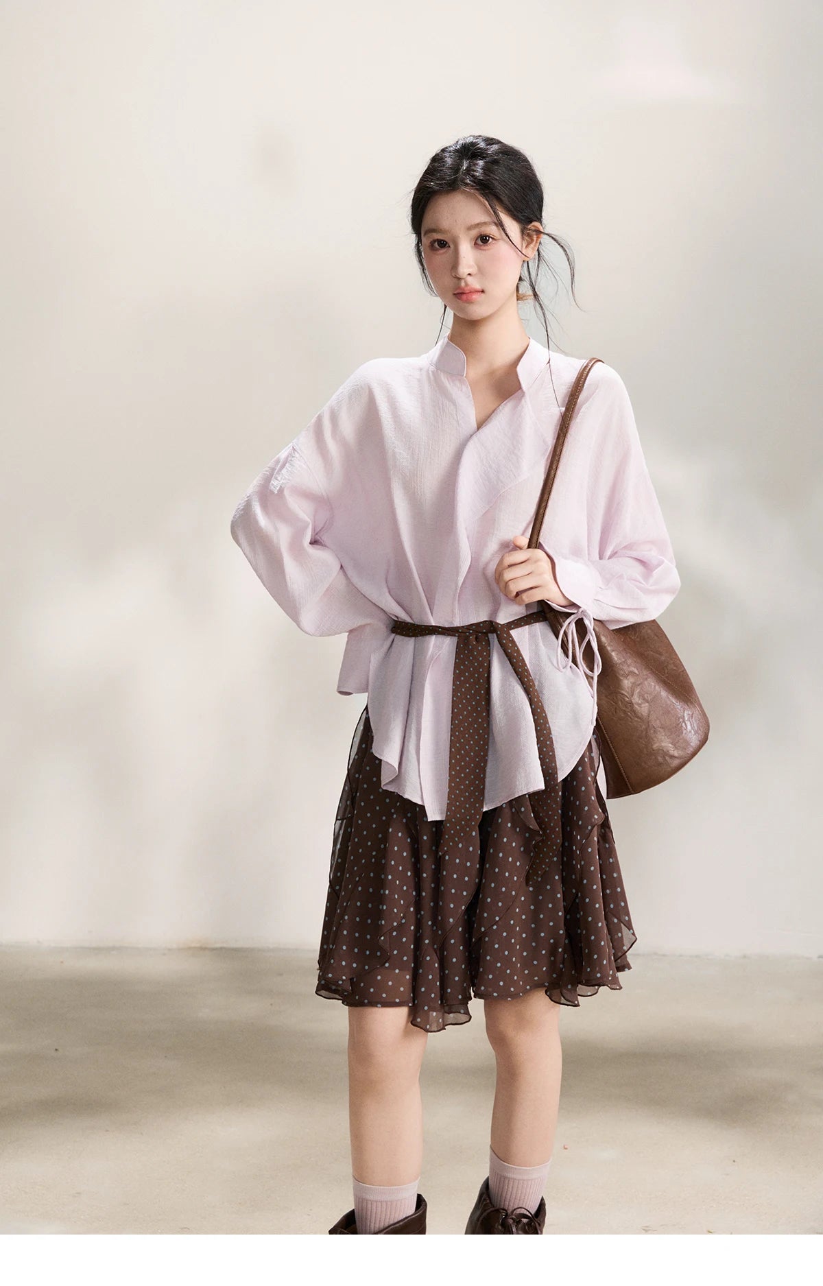 MISHOW Women's Asymmetric V Neck Shirts 2026 Spring Lapel Casual Loose Tie Cuffs Solid Shirt with Polka Dot Ribbon MXF108X1002