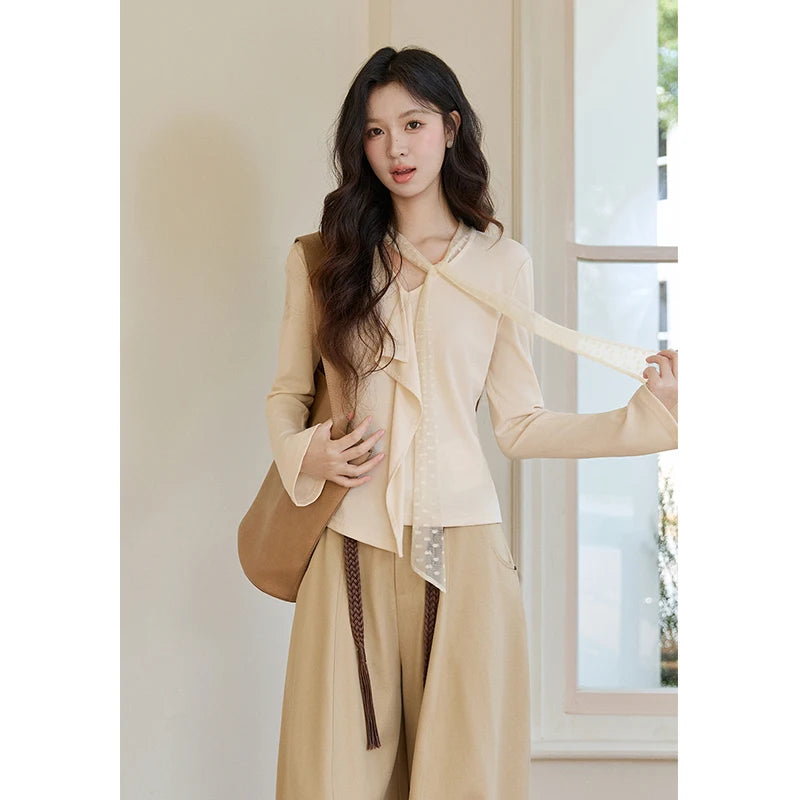 MISHOW Women's V-neck Splicing Lace Ribbon Long Sleeve Tops Spring Ruffled Asymmetrical Hem Flare Sleeve Knitwear MXF108Z1016