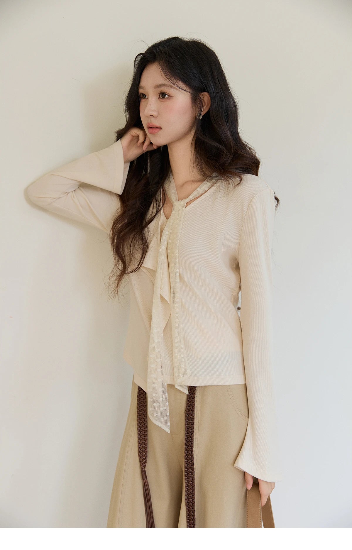 MISHOW Women's V-neck Splicing Lace Ribbon Long Sleeve Tops Spring Ruffled Asymmetrical Hem Flare Sleeve Knitwear MXF108Z1016