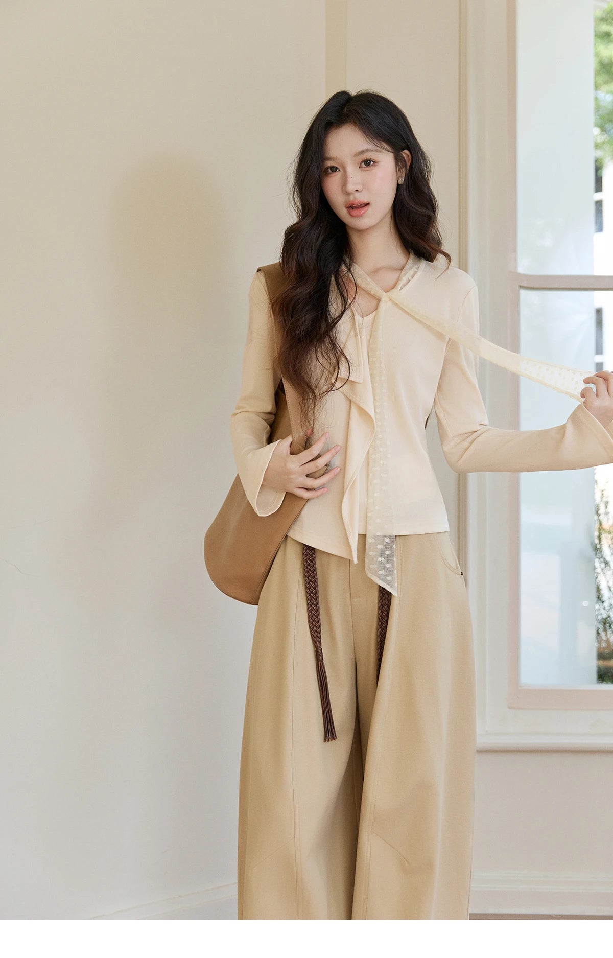 MISHOW Women's V-neck Splicing Lace Ribbon Long Sleeve Tops Spring Ruffled Asymmetrical Hem Flare Sleeve Knitwear MXF108Z1016